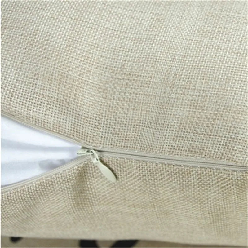Close-up of a beige fabric surface with a zipper